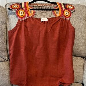 Rust Sleeveless Top with Crochet Details. Can fit medium